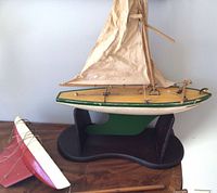 Both sailboats together showing relative size and condition