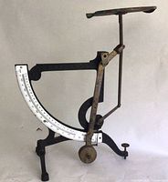 Full view of cast iron and brass balance scale