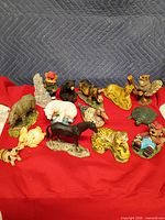Group shot showing all 14 animal figurines together
