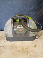 Front view of Bissell Little Green cleaner