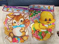 Front view showing sealed packs of Easter cutouts
