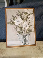 front view of framed painting showing floral subject