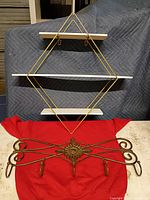 Overall view showing both the diamond wall shelf and hook rack