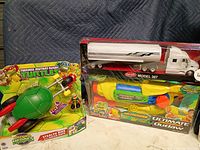 All three packaged toys grouped together