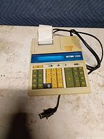 Top view of Victor 1250A adding machine showing keyboard, printer, missing key