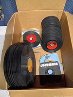 Overview of box with LP stack, 45 stack, Columbia and Epic sleeved singles