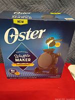 Front of Oster Vertical Waffle Maker box