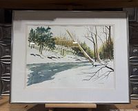 Frontal view of framed watercolor painting