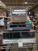 Front view of all four stacked electronic components