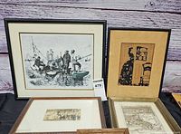 Group shot of four framed artworks