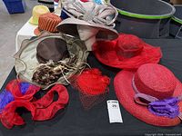 Group shot of all six hats on table