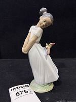 Full view of figurine showing pose and height tag 575