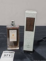 Open Tova Signature Autumn bottle and boxed Tova Signature perfume