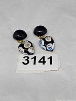 Front view of full earring pair with lot tag