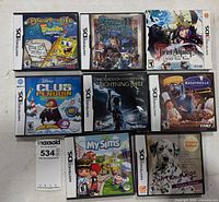 Front view of all eight game cases arranged in rows