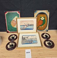 Group shot of all eight framed artworks together