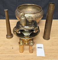 Group shot of all brass items in lot