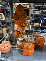 Group shot of all Halloween decor items on shelf