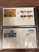 Both 1990 Canada first day covers in sleeves