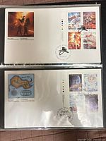 Two FDCs in sleeves: upper Firefighters pane with four 40¢ stamps and cachet; lower Oak Island cachet