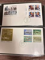 Both first day covers inside album page; medical doctors FDC above, prehistoric life FDC below