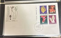 Full view of envelope with stamps and postmark