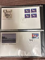 Both first day covers in sleeves showing stamps and cachets
