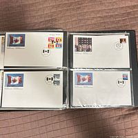 Binder page showing all four first day covers
