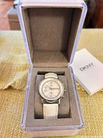 Watch in open DKNY box showing full view