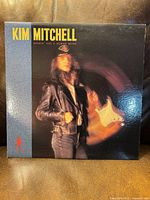 Front cover showing album art and title