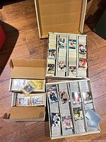 Overview of three long boxes filled with hockey cards