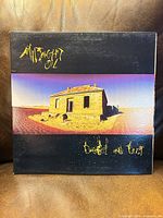 Front cover showing album art and title