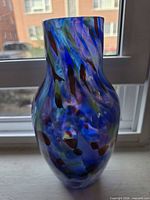 Full view of multicolour hand-blown glass vase