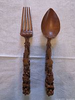 Full view of spoon and fork showing overall form and size