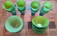 Overhead view of stacked tumblers and bowls showing quantity and gradient coloring