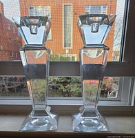 Full front view showing both candlesticks on windowsill