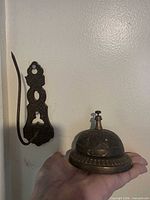Desk bell and receipt hook together for scale and patina