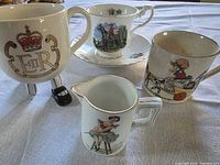 Front view of all five pieces showing designs and shapes