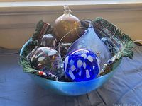 Entire lot in bowl showing ornaments, runner and bowl