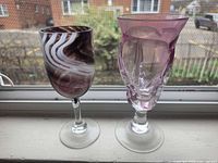 Front view of both goblets showing color and overall shape