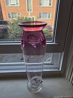 Full view of vase on windowsill showing shape, color transition and height