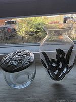 Vase and lidded jar side by side showing pewter overlays