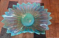 Top view showing sunburst pattern and ruffled edge