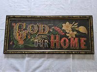 Full view of framed art showing text and floral design