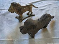 Top view of lion doorstop and dog nutcracker