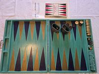 Open board with accessories and rule booklet visible