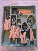 Tray showing entire flatware assortment