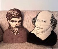 Front view of both portrait pillows on couch