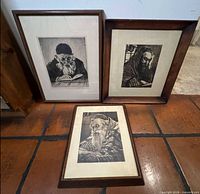 All three framed etchings grouped together