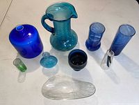 Group shot of all glass items arranged on table